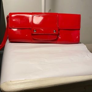 Red patent leather clutch